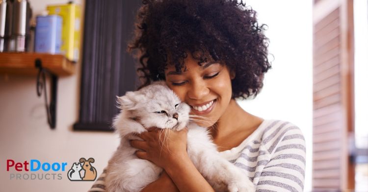 Happy cat owner - Train a Cat to Use a Pet Door -  Pet Door Products Utah