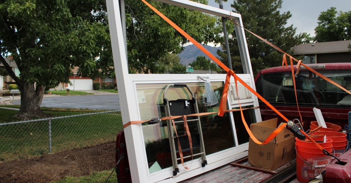 Dog using a Pet Door Products' sliding door in a Utah home